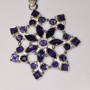 Elegant Silver and Purpletanzanite Snowflake Pendent
